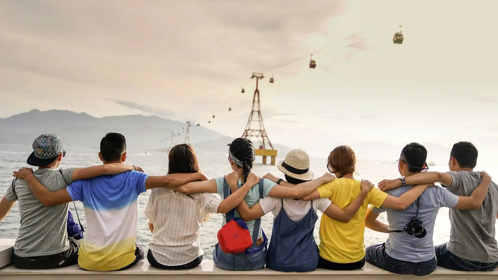 Friends with their arms around each other